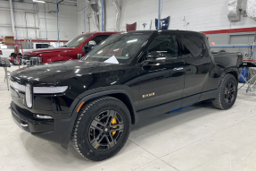A line of shiny pick ups in the Fabel Collision Center